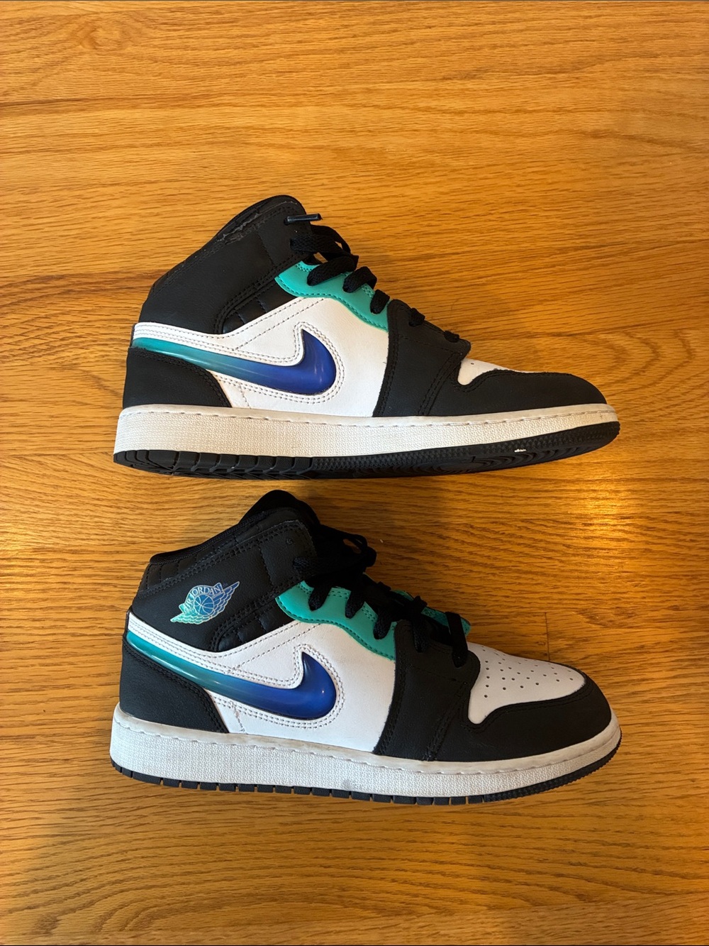 Nike Air Jordan Kids Black, White & Teal High-Top Sneakers with Blue Swoosh